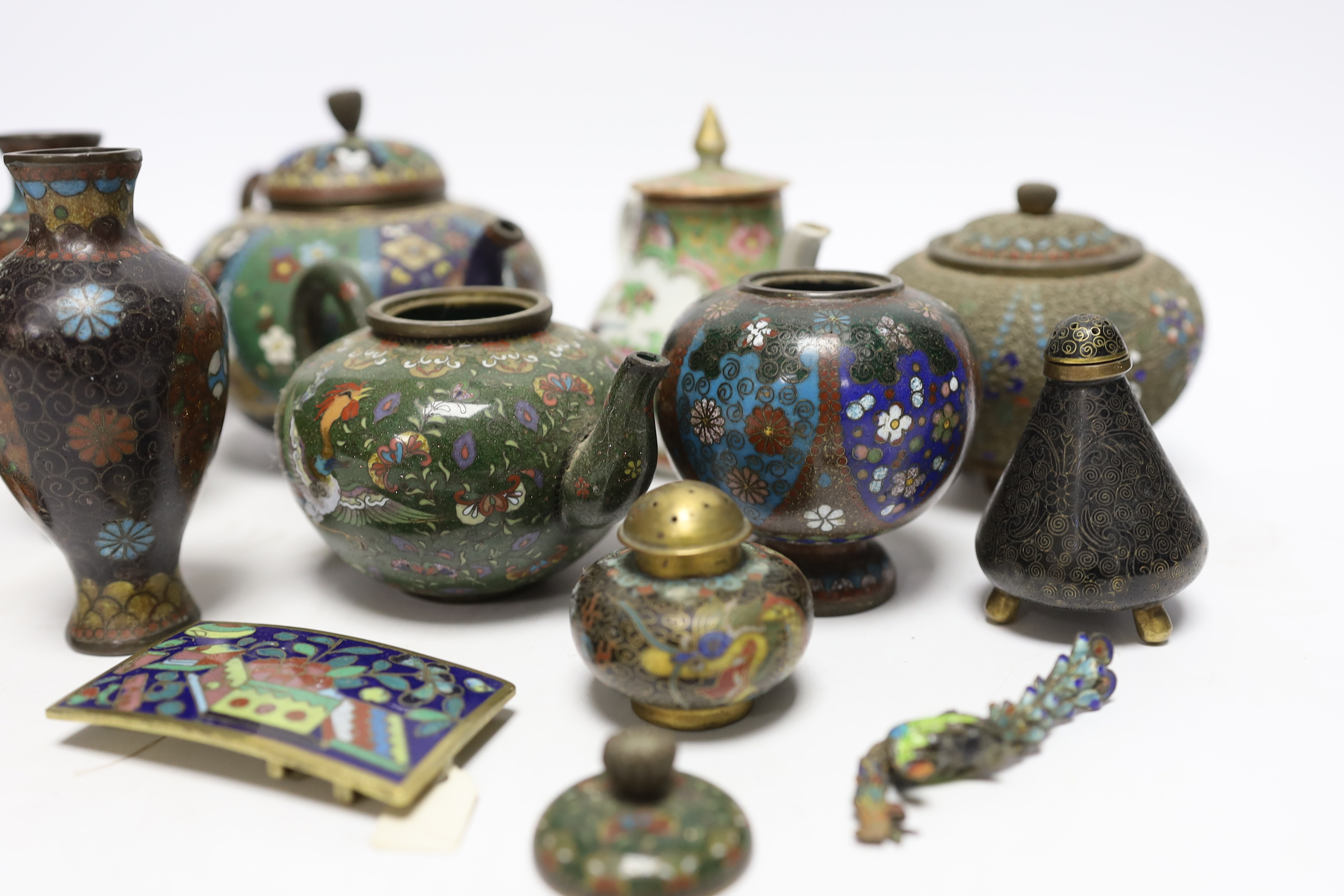 Two miniature Cantonese porcelain teapots, and a small collection of Chinese and Japanese cloisonné and champlevé enamel wares (12)